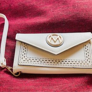 Cute brand new never used off white MIA K Collection wallet